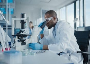 Researchers in a biotechnology laboratory