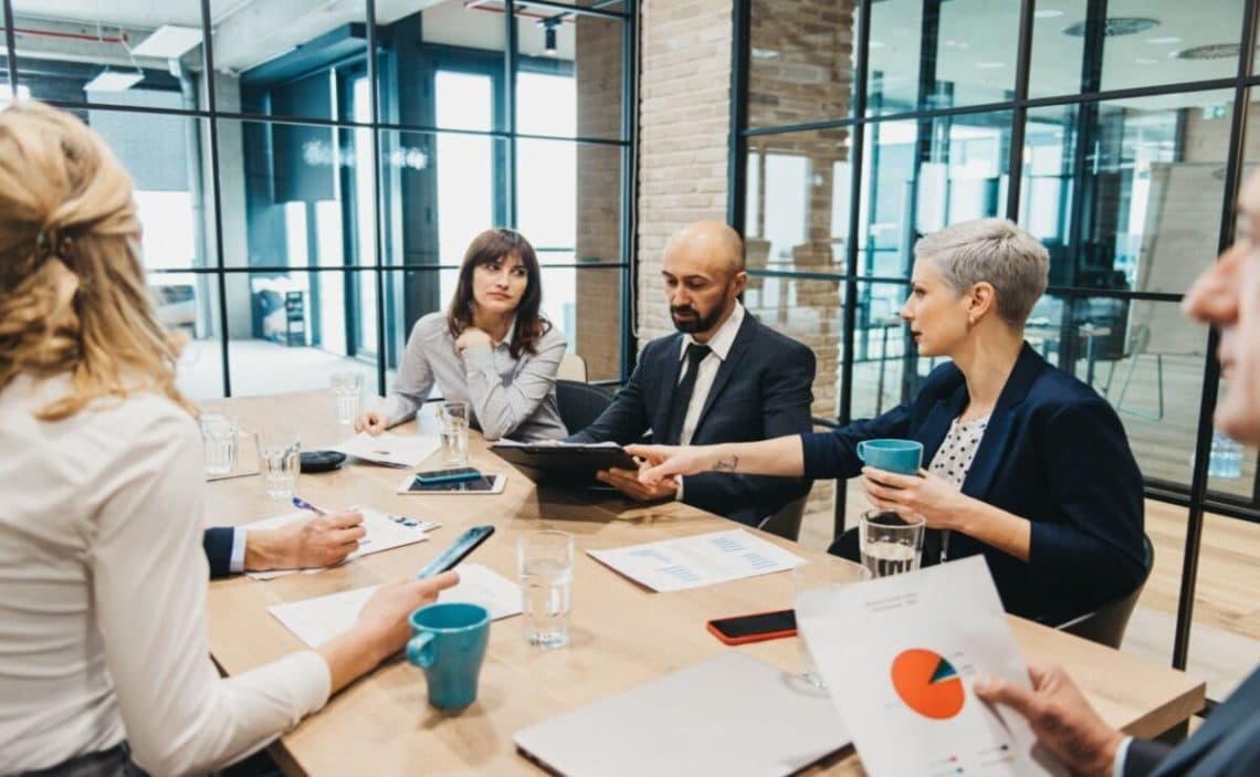 Business team discusses a business plan in the office