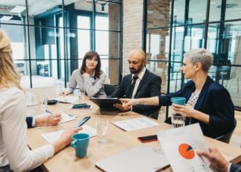 Business team discusses a business plan in the office