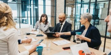 Business team discusses a business plan in the office