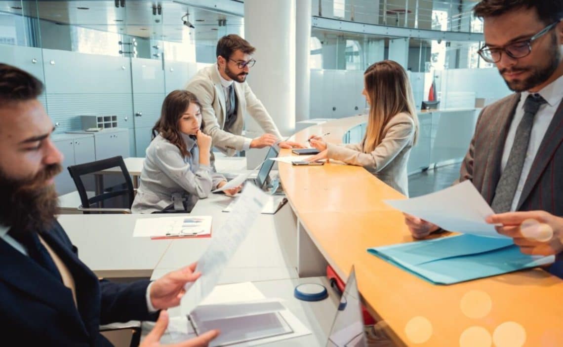 Bankers giving attention to businessman