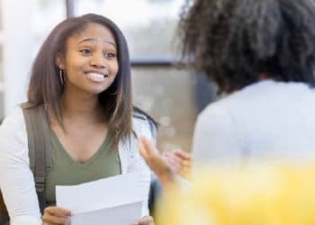 girl holding a recommendation letter for scholarship