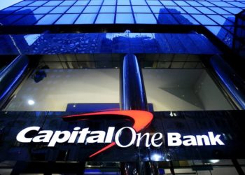 When does Capital One report to the credit bureau?