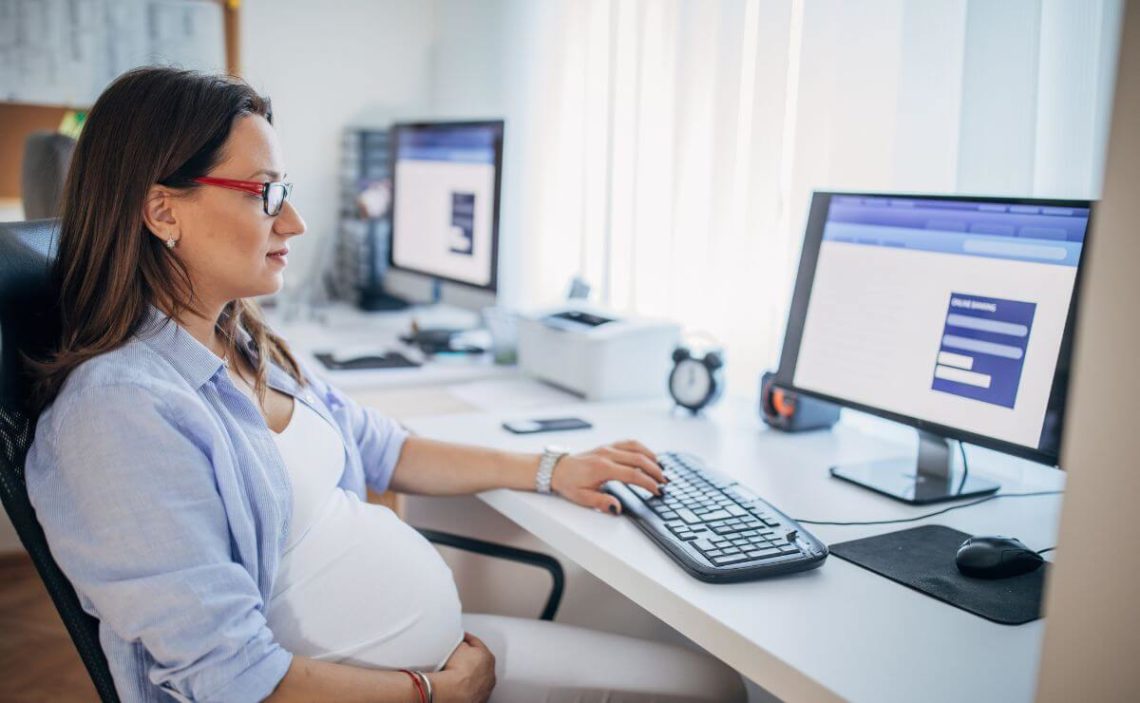 Pregnant Woman Working