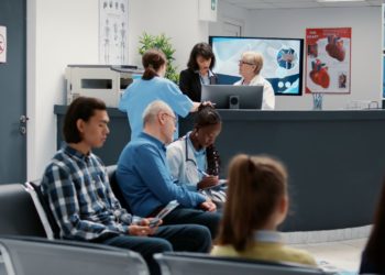 People at a waiting room, in a hospital