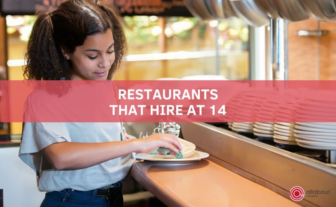 Teenager washing the dishes at a restaurant