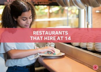 Teenager washing the dishes at a restaurant