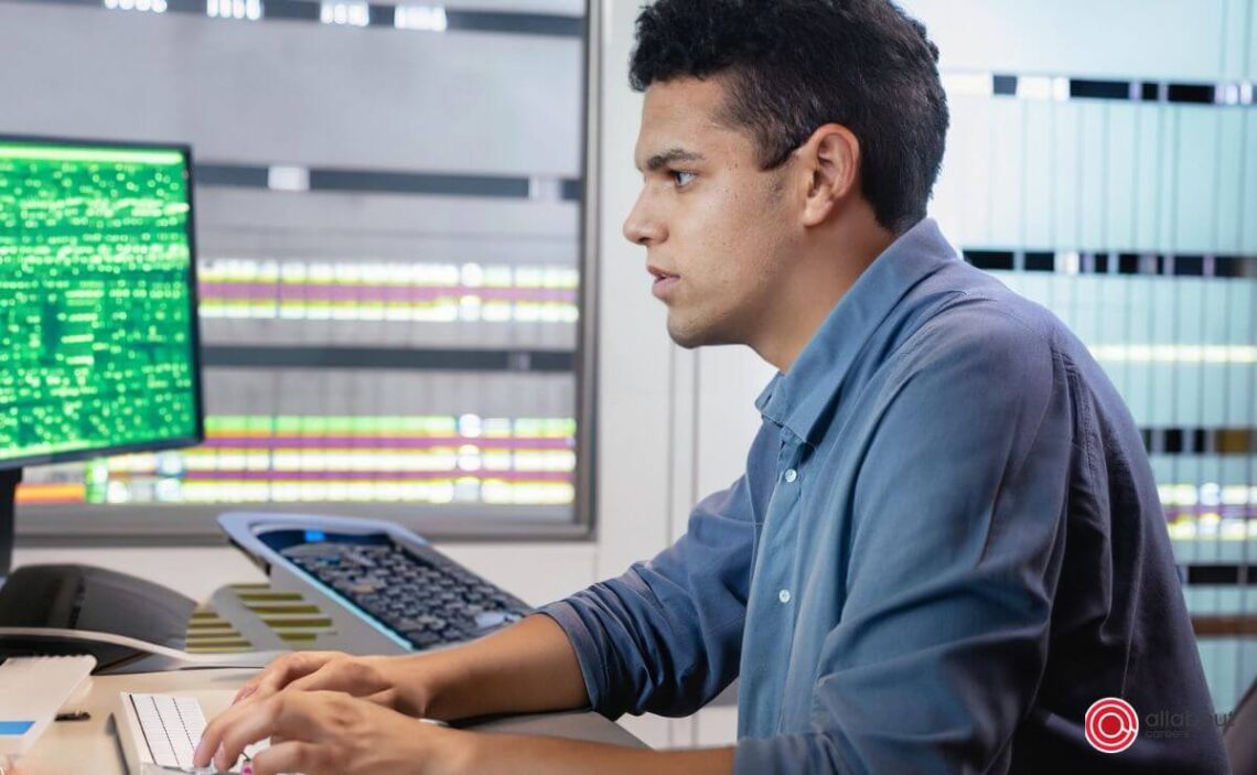 young adult male working in Electronic Data Processing